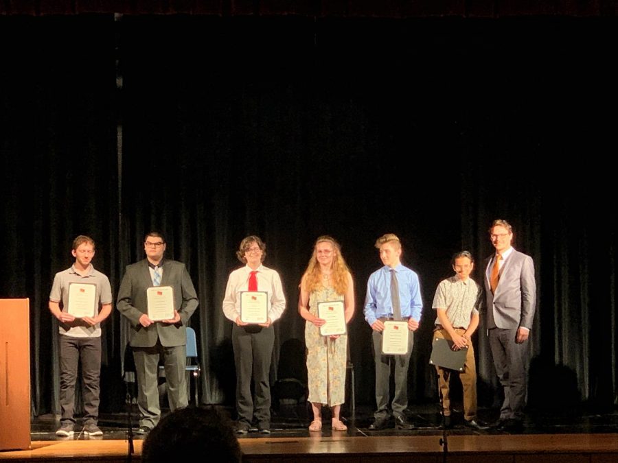 German students accepting their awards.
