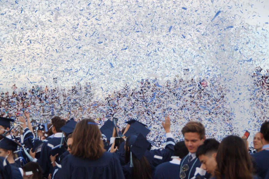 The confetti takes the field as the graduates celebrate. (2019)