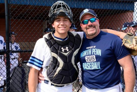 Joe (right) and Jake (left), father and son, pose for a picture at a North Penn baseball game.