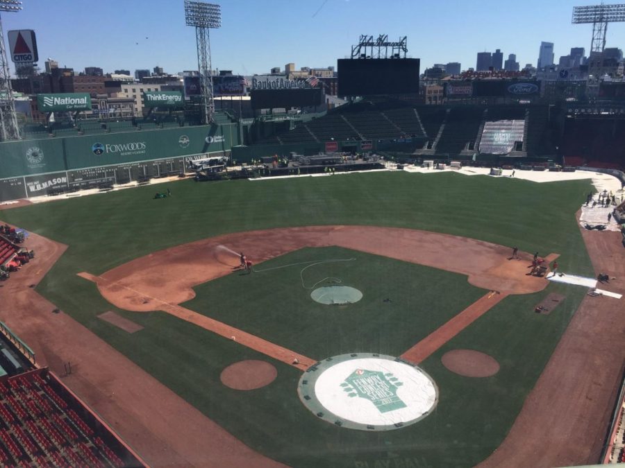 Workers at Fenway Park tearing down a stage the morning after a Paula Abdul/Boyz II Men/New Kids on the Block concert.