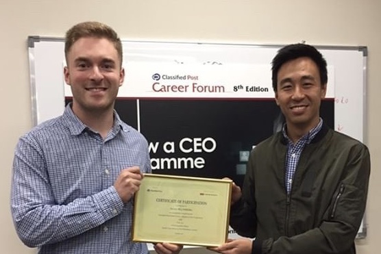 North Penn Alumni Steven Blumberg (left) and the CEO of the South China Morning Post (right) meet and pose for photos.