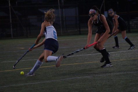Erin ODonnell gets past a Titans defender in the Knights win over CB South.