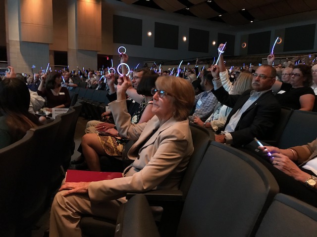 Prior+to+former+NFL+quarterback+Ryan+Leafs+speech%2C+attendees+of+the+Penn+Foundations+annual+fundraiser+at+Pennridge+High+School+lift+colorful+glowsticks.+Purple+represents+recovery%2C+and+white+represents+peace.