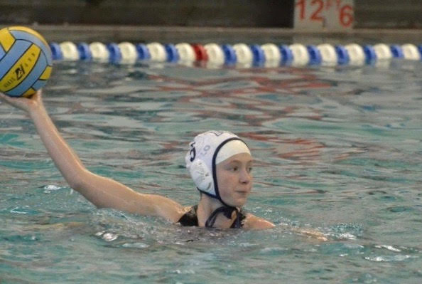 Abbie Broadhead prepares to throw in the ball at a North Penn water polo game.