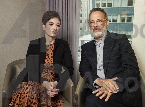 Tom Hanks poses for a promotional photo regarding his new movie, A Beautiful Day in the Neighborhood.