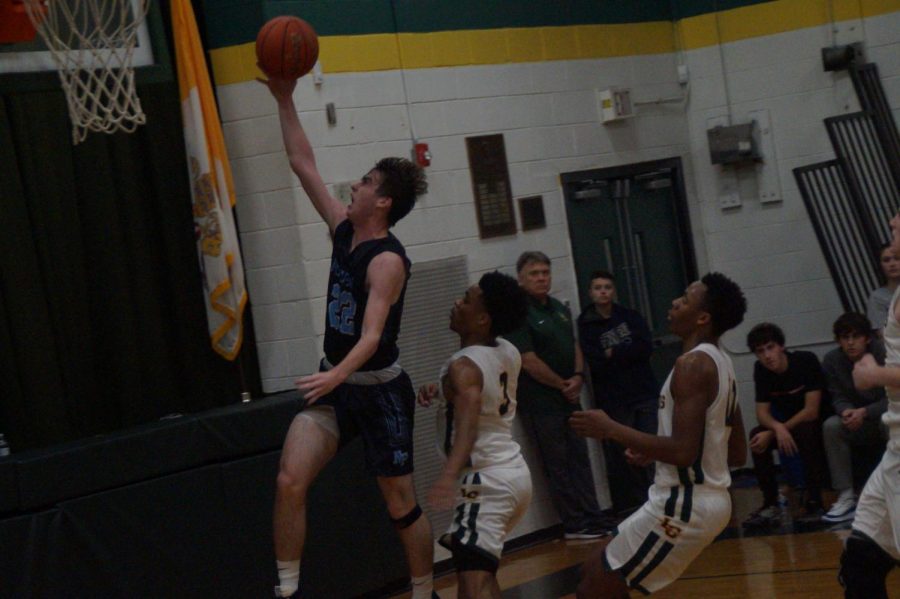 Mike Chaffee scores a layup on the fast break.