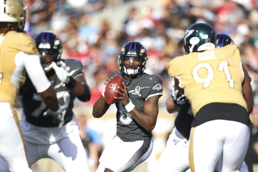 AFC quarterback Lamar Jackson drops back to pass against the NFC in the Pro Bowl NFL football game, Sunday, Jan. 26, 2020 in Orlando, Fla. (AP Photo/Doug Benc)