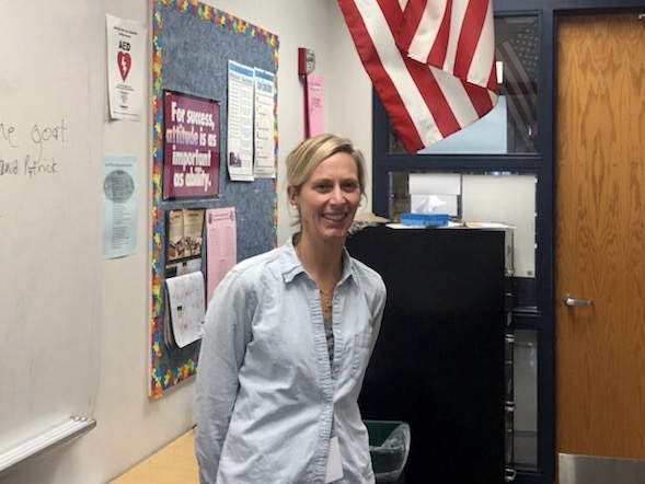 Mrs. Jami Behm smiles in her K-pod classroom.