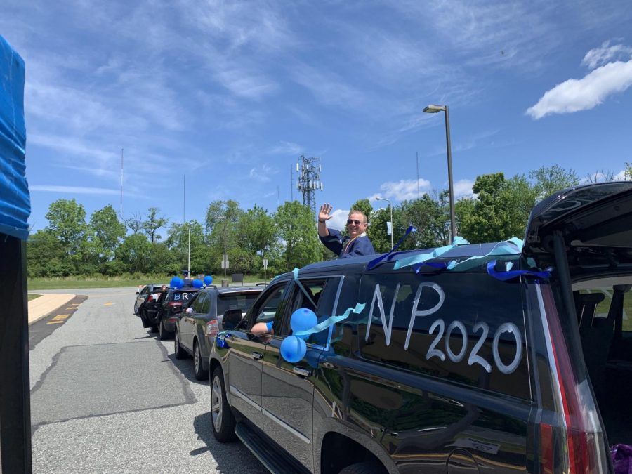 Peter Yourl celebrates as he begins the parade of North Penn High School graduates. Students paraded through Crawford Stadium during the week of June 1-7 as Covid-19 changed the graduation plans for schools around the world. 