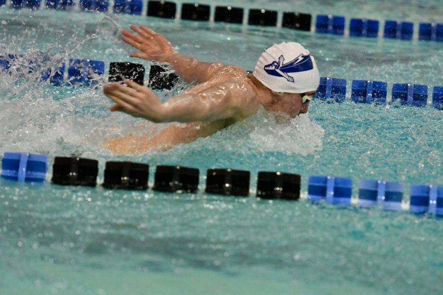 Clark competing in a Knights swim meet.