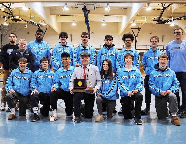 The 2020-21 North Penn Knight wrestling team after capturing the conference title in February. 