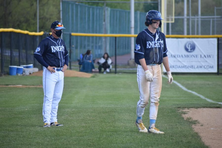 North Penn coach Kevin Manero and senior Evin Sullivan during the 3rd inning of Wednesdays contest