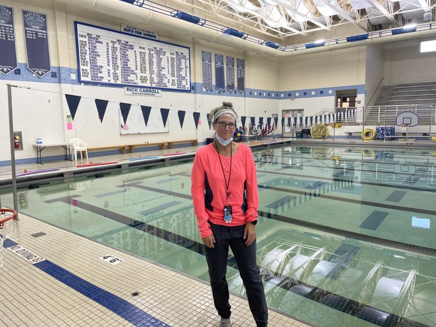 Ms. Tory Young in front of the North Penn swimming pool where a variety of aquatic sports and classes are held.