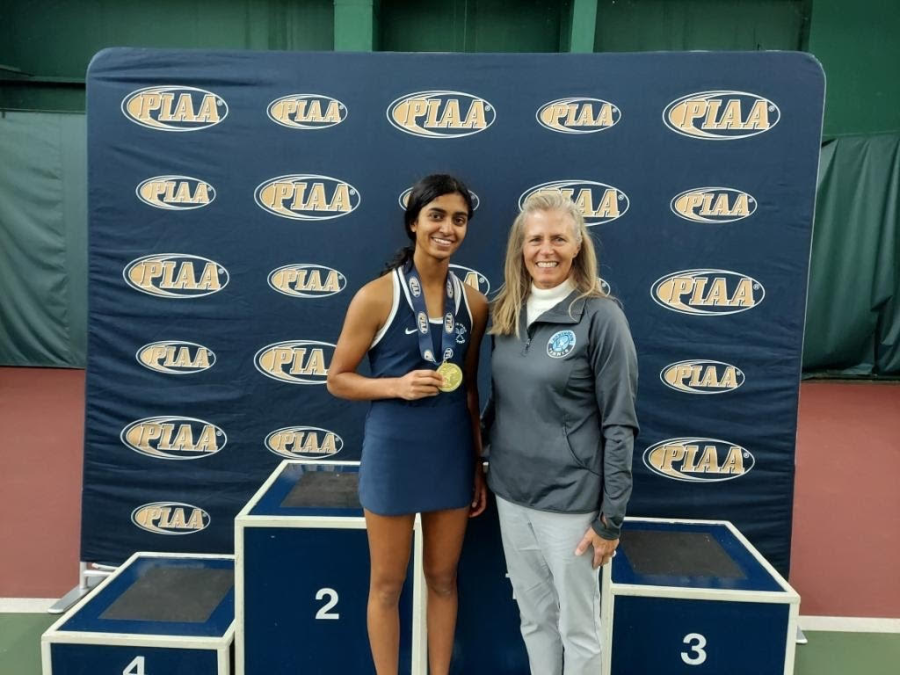 Esha+Velaga+%28left%29+and+Coach+Renee+Didomizio+%28right%29+stand+proud+in+front+of+the+podium+at+states.
