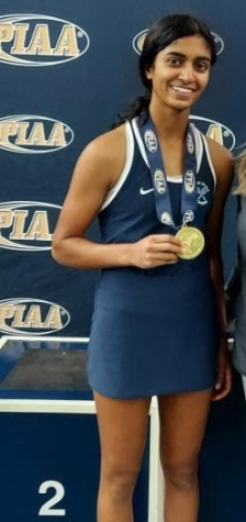 KC FILE PHOTO: Esha Velaga stands proud in front of the podium at states. alongside her coach Renee Didomizio. 