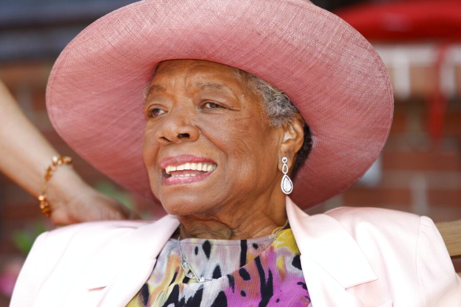 Maya Angelou smiles as she greets guests at a garden party at her home Thursday, May 20, 2010 in Winston-Salem, N.C. (AP Photo/Nell Redmond)