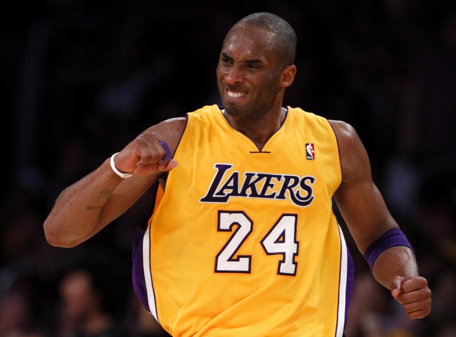 Los Angeles Lakers Kobe Bryant celebrates after making a three-point basket against the San Antonio Spurs during the second half of an NBA basketball game in Los Angeles, Tuesday, April 12, 2011. (AP Photo/Chris Carlson)