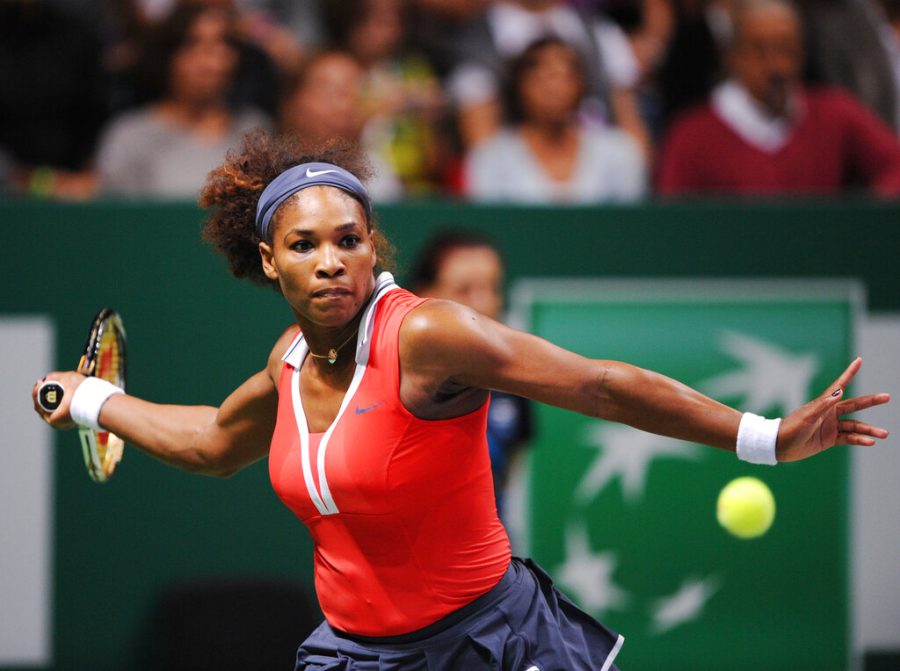 Serena Williams of the US returns a shot to Maria Sharapova of Russia during their final tennis match at the WTA Championships in Istanbul, Turkey, Sunday, Oct. 28, 2012. (AP Photo)