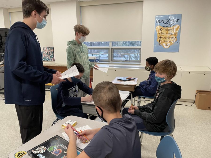 North Penn High School students team up with Montgomery Elementary students to teach Spanish as part of Montgomerys Cultural Club initiative. 