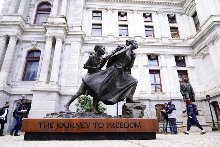 Shown is a statue of Harriet Tubman created by Wesley Wofford, outside of City Hall in Philadelphia, Jan. 18, 2022. (AP Photo/Matt Rourke)
