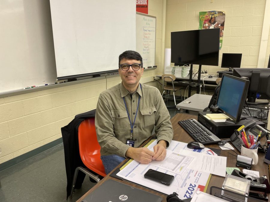 Mr. Aladdin Abou-Ouf setting up in his assigned classroom of the day: E136