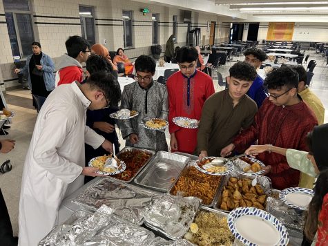 NPHS students come together in the cafeteria for an Iftar meal during Ramadan. 