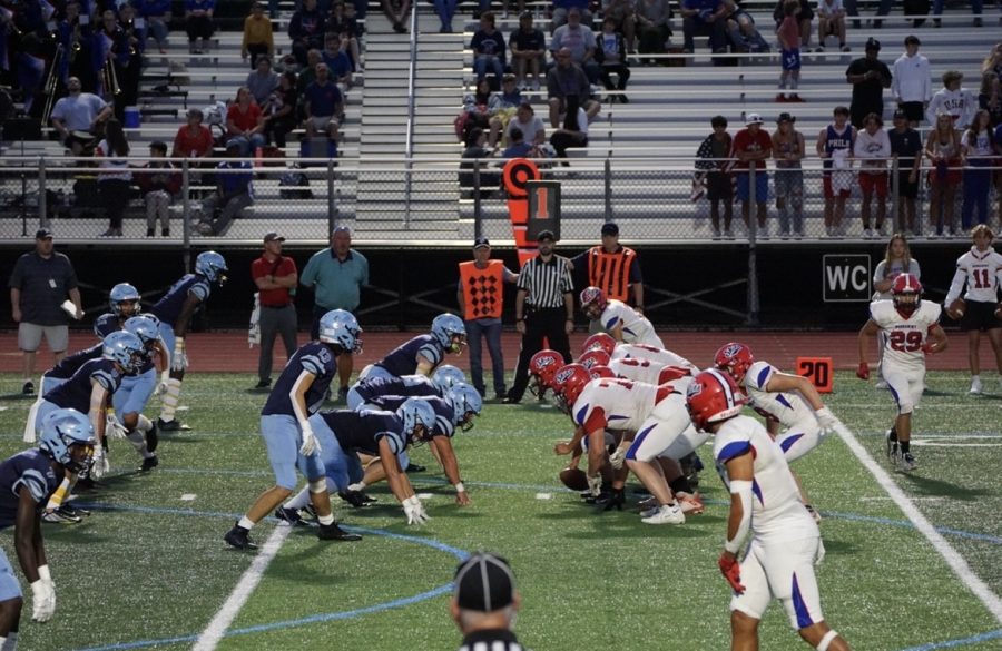North Penn lines up to defend Neshaminys first down attempt.