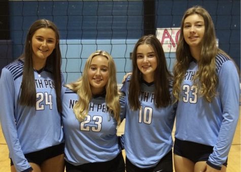 North Penn Volleyball Senior girls with McTaggart, far left #33, who also happens to be the tallest pictured.