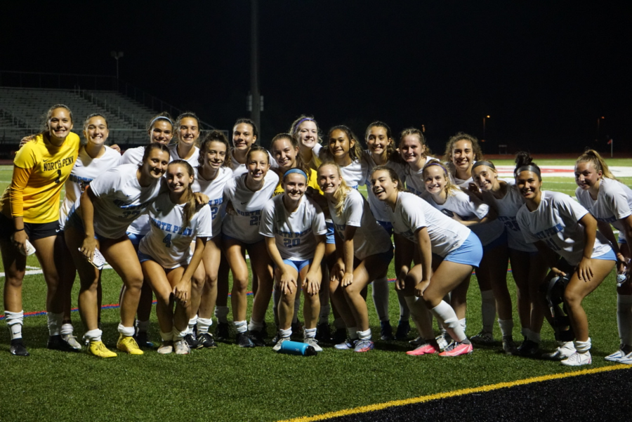 North Penn Girls Soccer smiling for the camera after celebrating their big win.