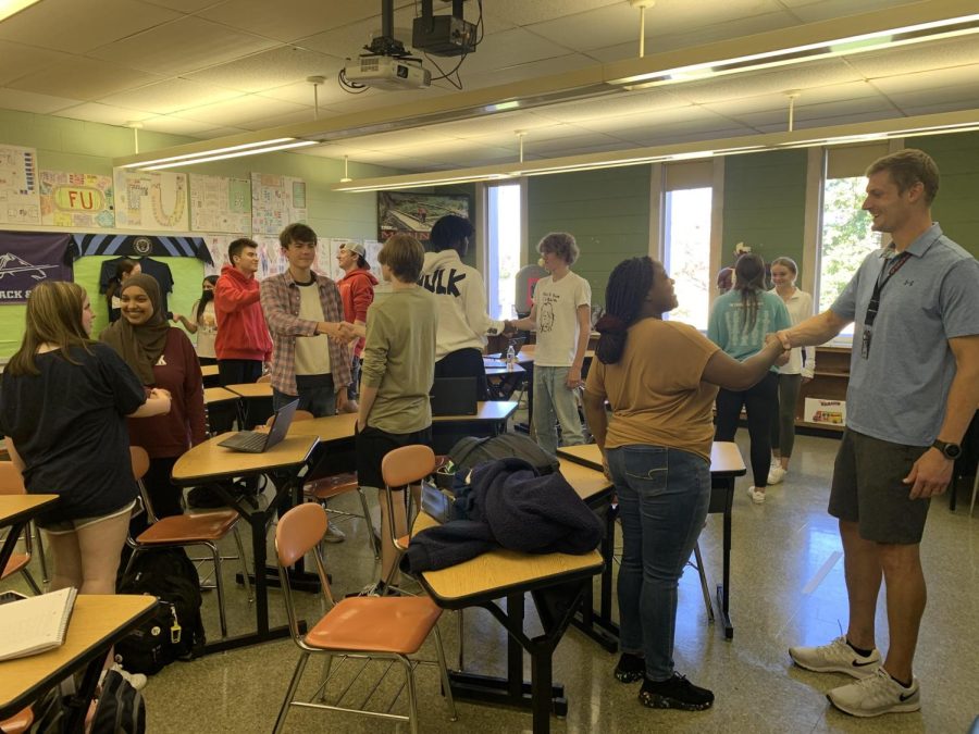 Leaders in the Making: Students participate in a handshaking activity in North Penn High Schools new leadership course. 