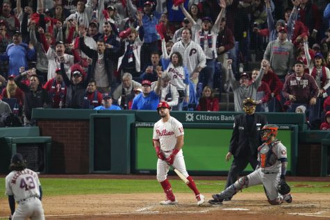 Philadelphia Phillies Kyle Schwarber watches his two-run home run during the fifth inning in Game 3 of baseballs World Series between the Houston Astros and the Philadelphia Phillies on Tuesday, Nov. 1, 2022, in Philadelphia. (AP Photo/Matt Rourke)
