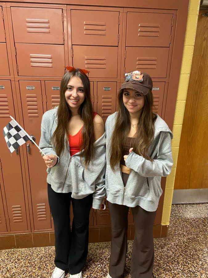 Just like best friends in the movie, best friends and twins Madi and Gwen Mannon (12th) pose as the dynamic duo Lighting Mcqueen and Tow Mater