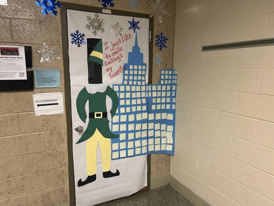 The best way to spread [holiday] cheer is singing loud for all to hear: This Elf themed door located on the way to second-floor E-Pod. 