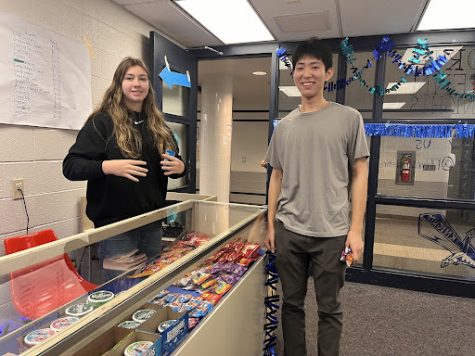 COME IN! WERE OPEN FOR BUSINESS: NPHS student Caleb An made a purchase at the NPHS school store. 