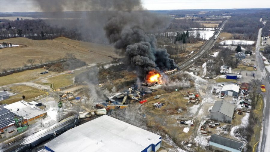 This+photo+taken+with+a+drone+shows+portions+of+a+Norfolk+Southern+freight+train+that+derailed+Friday+night+in+East+Palestine%2C+Ohio+are+still+on+fire+at+mid-day+Saturday%2C+Feb.+4%2C+2023.+%28AP+Photo%2FGene+J.+Puskar%29