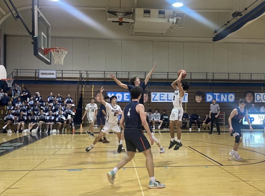 Mo Sgro takes a shot as North Penn battles 1st place CB East on Tuesday, February 8, 2023 at NPHS. 
