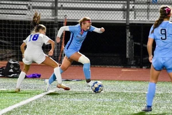 Holmes fights her way through the defense in the pursuit to put the Knights on the board during the 2022 Knights season