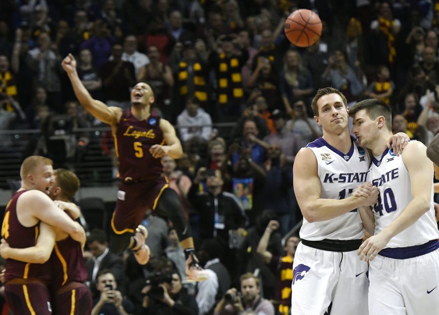 Kansas States Mason Schoen, left, and Kade Kinnamon (40) leave the court after a regional final NCAA college basketball tournament game against Loyola-Chicago, Saturday, March 24, 2018, in Atlanta. Loyola-Chicago won 78-62. (AP Photo/John Amis)