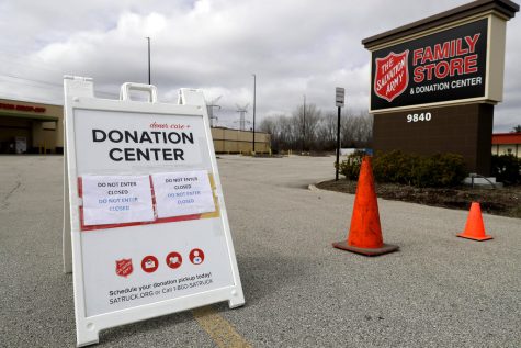 FILE - In this April 1, 2020 file photo, a closed sign is displayed outside a Salvation Army store and donation center in Glenview, Ill. Across the country, drug and alcohol recovery programs claiming to help the poor and the desperate are instead conscripting them into forms of indentured servitude, requiring them to work without pay or for pennies on the dollar, in exchange for their stay. For the first time, Reveal from The Center for Investigative Reporting has determined how widespread these programs have become. In 1990, in response to a complaint from a former participant, the Labor Department launched an investigation into the nations largest chain of work-based rehabs, The Salvation Army, which operates about 100 programs across the country. At The Salvation Armys rehabs, participants were required to work full time processing donations for the organizations thrift stores, receiving a stipend of only $5 to $20 a week. The department found The Salvation Army had violated labor laws and ordered the nonprofit to pay its participants minimum wage. The Salvation Army refused to comply. It sued, then enlisted members of Congress to defend the venerable charity. Within a month, the department backed off.(AP Photo/Nam Y. Huh, File)
