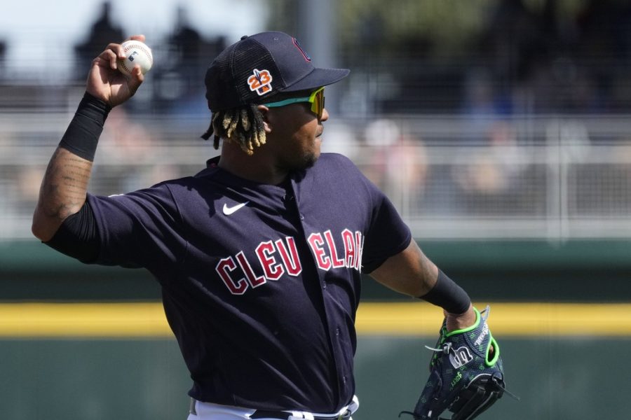 Cleveland Guardians third baseman Jose Ramirez warms up during the second inning of a spring training baseball game against the Los Angeles Angels Tuesday, March 14, 2023, in Goodyear, Ariz. (AP Photo/Ross D. Franklin)