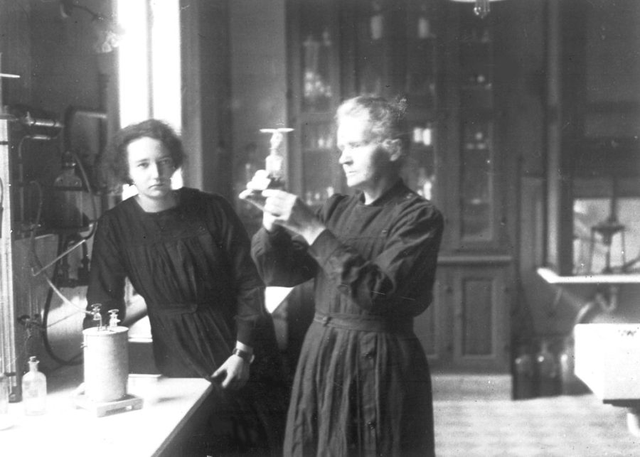 Polish physicist and chemist Madame Marie Curie, right, works in a laboratory, with her daughter Irene, in Paris France, April 20, 1927. Curie, along with her husband, Pierre, first isolated the two highly radioactive elements, radium and plutonium, from uranium ore 25 years before. (AP Photo)