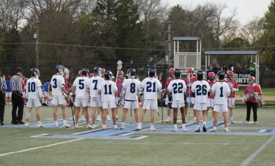 The+2023+boys+Lacrosse+team+faces+off+with+Neshaminy+before+one+of+their+games.+