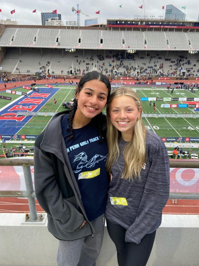 Running down a Dream: Maya Adams (left) and Maddie Lewis (Right) take a break at last weeks Penn Relays. Both Adams and Lewis will attend St. Joes next year in hopes of continuing to push each other on the track. (Submitted Photo) 
