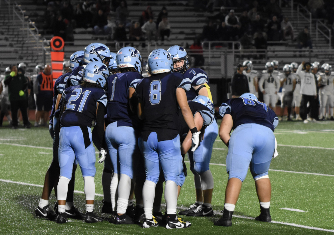 Knights huddle before a play on Friday, October, 20 2023. The Knight defeated Pennridge 17-16. 