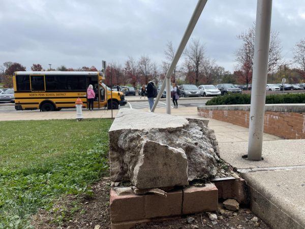 CRACKS IN THE FORTRESS: Crumbling concrete along the front steps of NPHS reveals much needed infrastructure changes that are visible in and outside of North Penn High School.