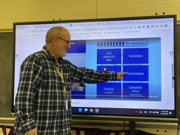 Teacher Talk: Mr. Brian Haley, NPHS Social Studies teacher, navigates the Reimagine NPHS website. Teachers in the everyday trenches have varying views on how the potential full scale NPHS renovation could affect daily life. 