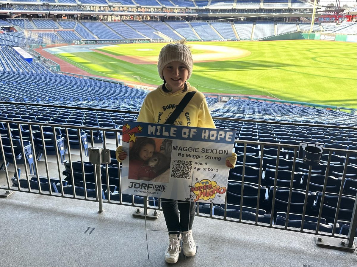 BE MAGGIE STRONG - Maggie Sexton holding up her hero sign this year at the JDRF walk.