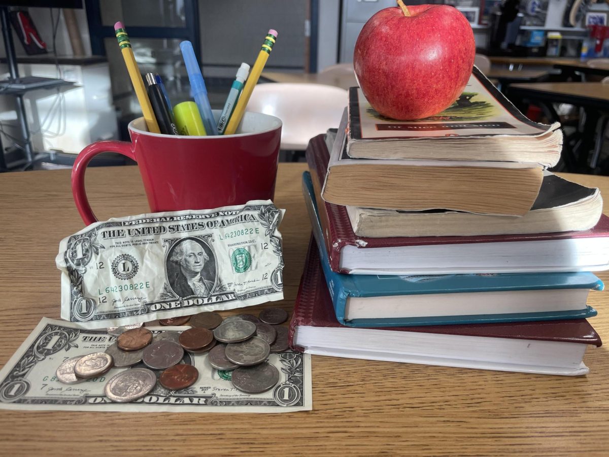 TEACHERS+WALLETS+ARE+EMPTY.+An+abundance+of+knowledge%2C+yet%2C+pinching+their+pennies.+Considering+their+value%2C+teachers+in+America+today+are+not+compensated+adequately+for+their+efforts+and+impact.%0A