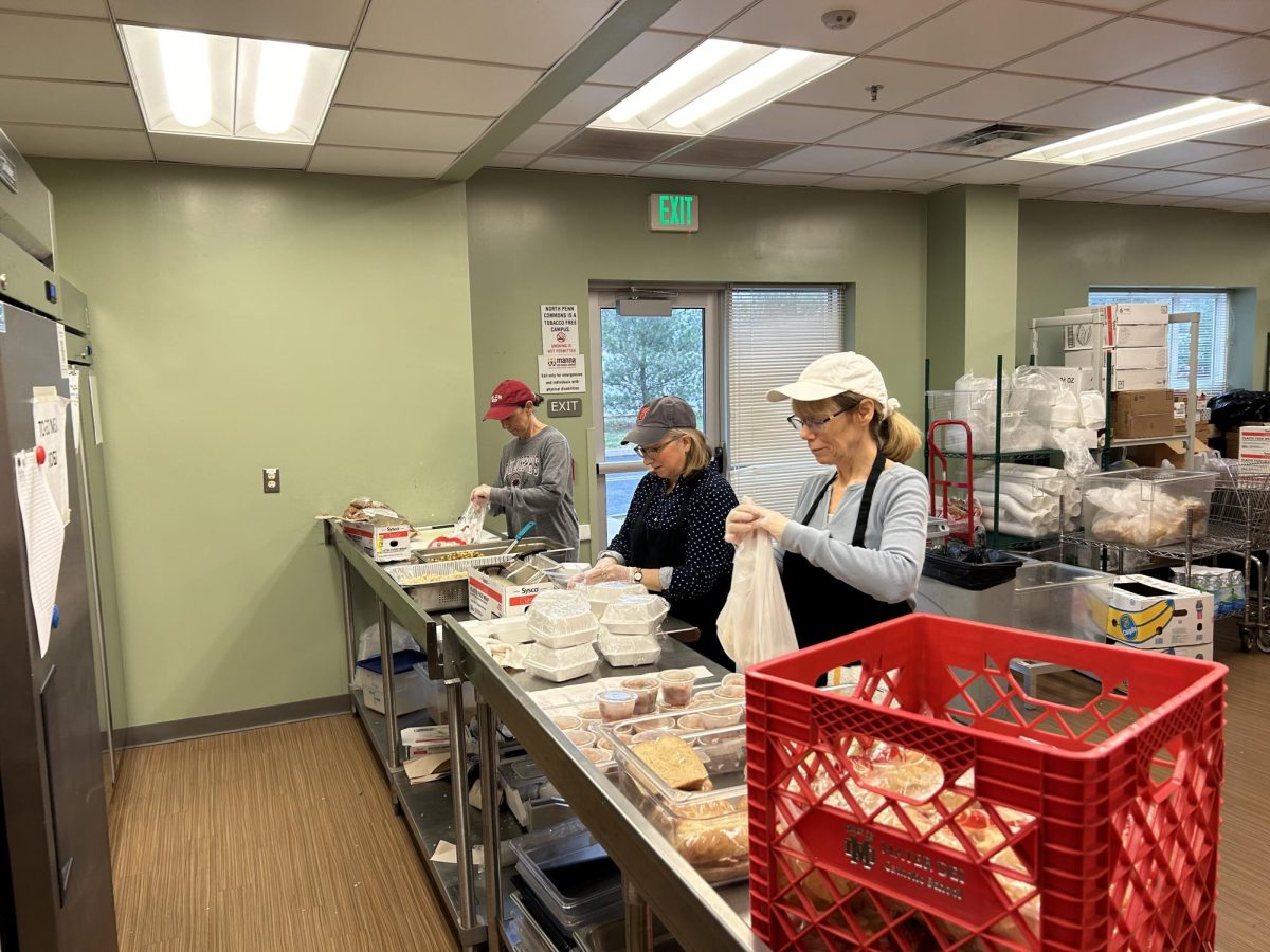 Serving the Community: Manna on Main St volunteers prepare food during the 2023 holiday season in Lansdale, PA 