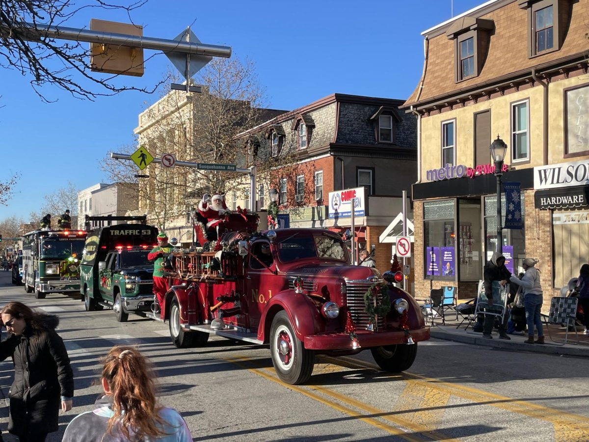 SANTA! The star of the show made his appearance at the end of the parade on his sleigh.
